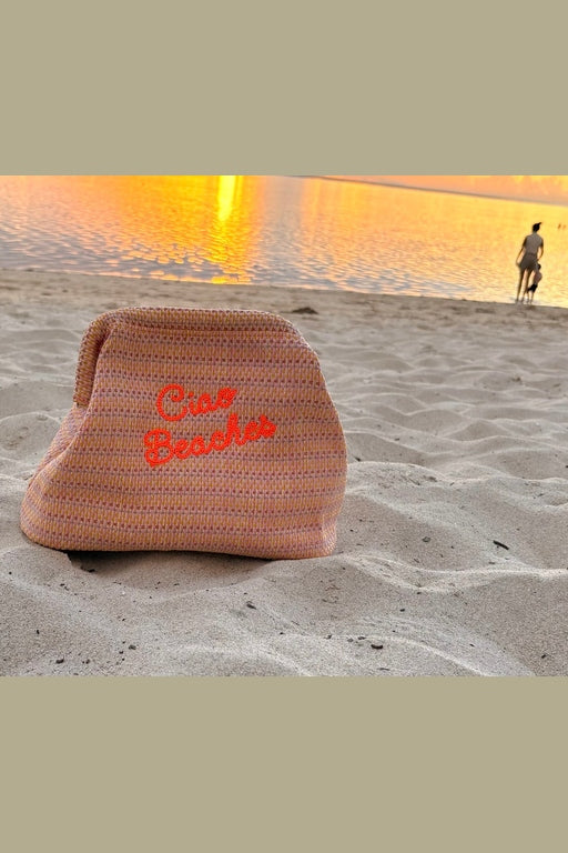 Neon orange Ciao Beaches clutch pouch by Lilly Loves with zipper closure and compact design, perfect for carrying small essentials.