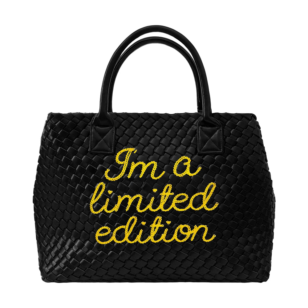 Lilly Loves limited edition yellow handbag with stylish design and textured material, showcasing a chic accessory for fashion.