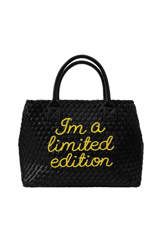 Lilly Loves limited edition yellow handbag with stylish design and textured material, showcasing a chic accessory for fashion.