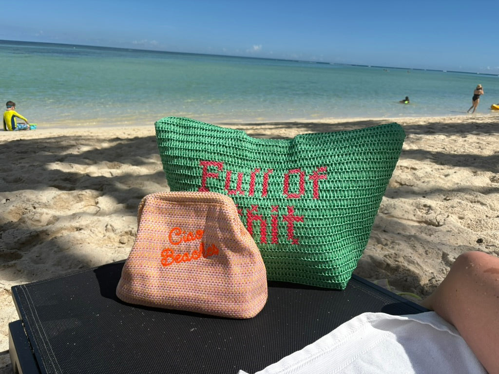 Neon orange Ciao Beaches clutch pouch by Lilly Loves with a sleek, compact design and vibrant color for stylish accessories.