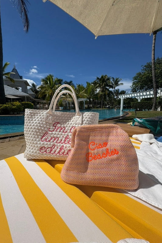 Neon orange Ciao Beaches clutch pouch by Lilly Loves with a vibrant, compact design and zipper closure.