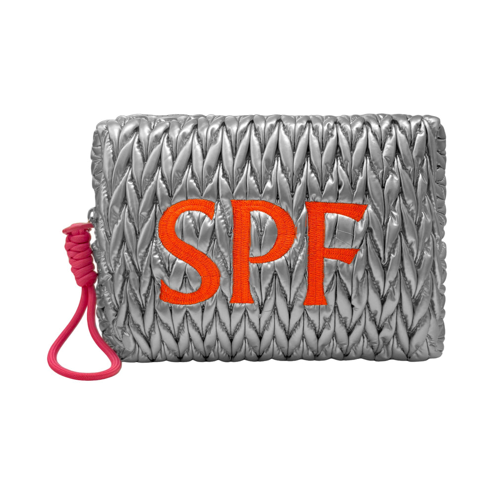 Silver SPF cosmetic wash bag by LillyLovesLTD with a sleek, compact design and zipper closure for travel and storage.
