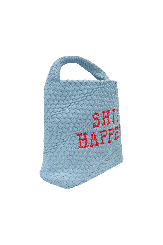 Lilly Loves Shit Happens bucket handbag with drawstring closure and stylish design, shown in natural beige fabric.