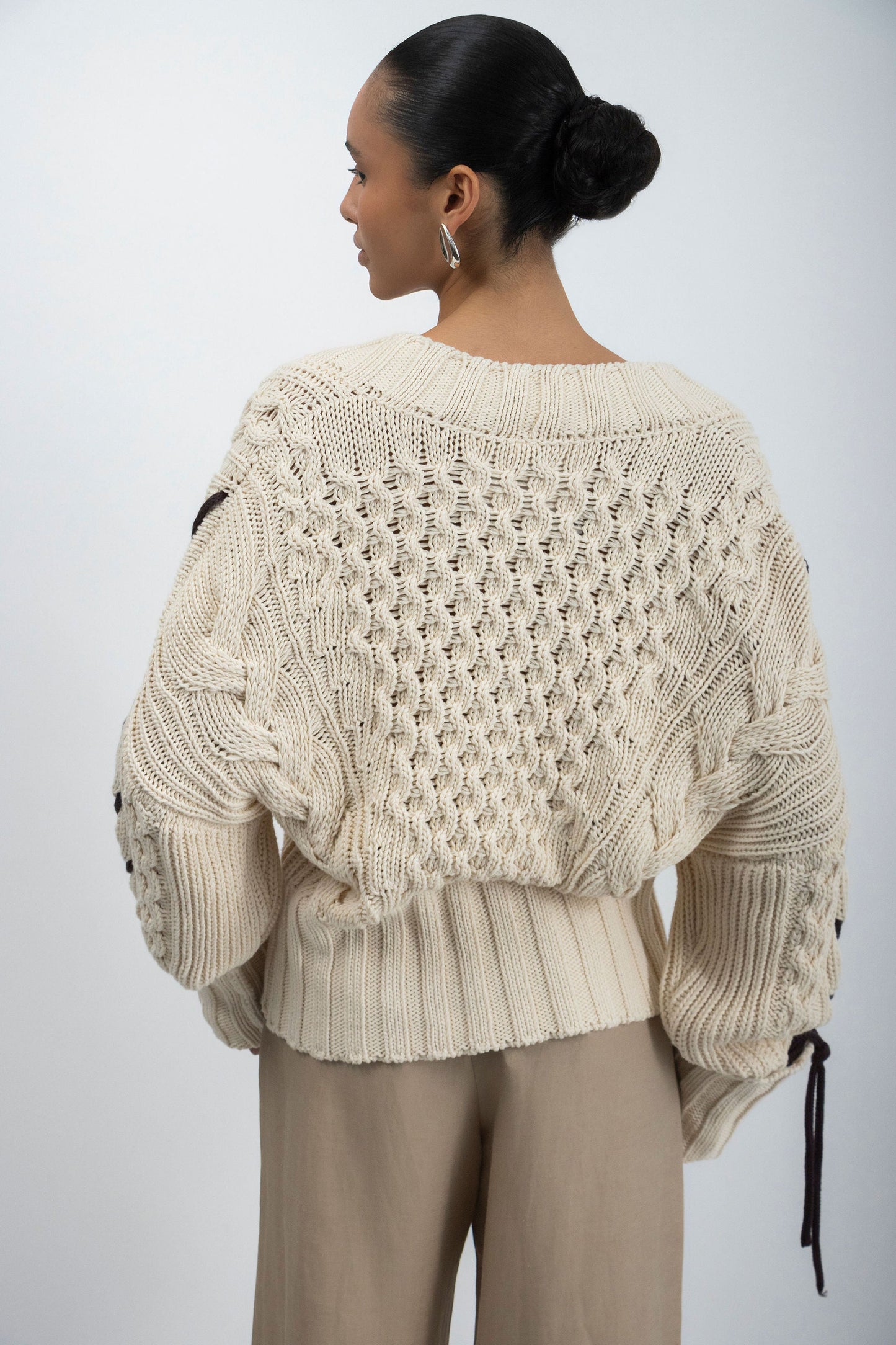 LA ENROLLA SWEATER.