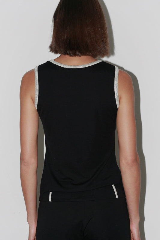 Back view of the Jade Top – simple black design with clean lines and a refined finish.