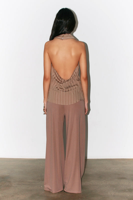 back view of the Belen Top highlighting its tailored fit and open-back design.