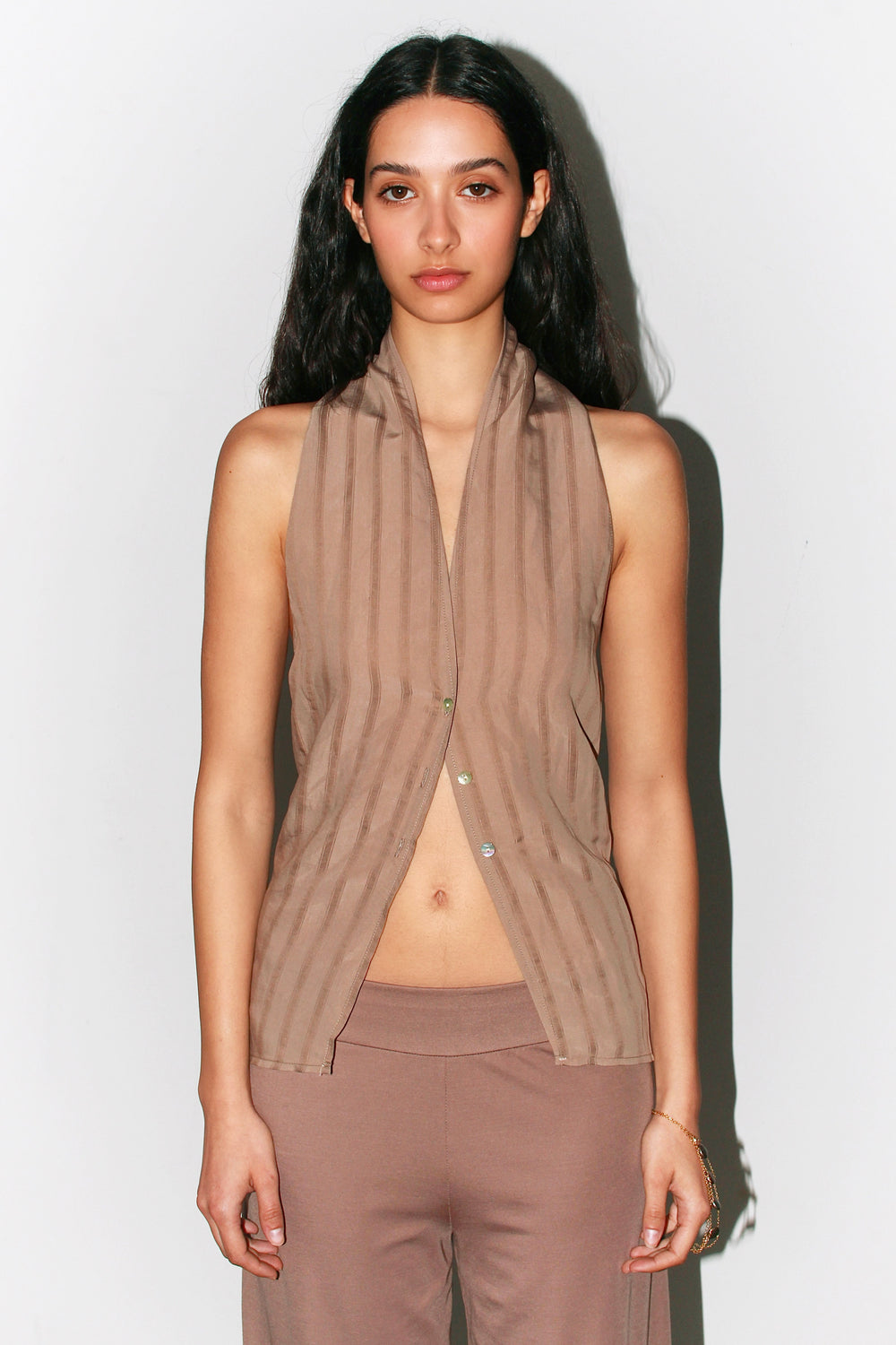 Front view of the taupe striped Belen Top, featuring contrast buttons and a convertible neckline.