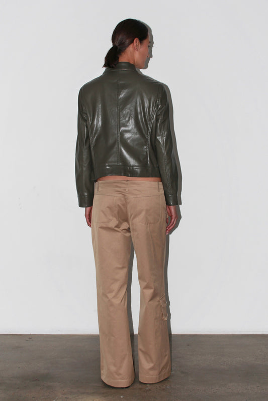 Side view of the Marina Beige Pants – elegant straight leg and refined texture.