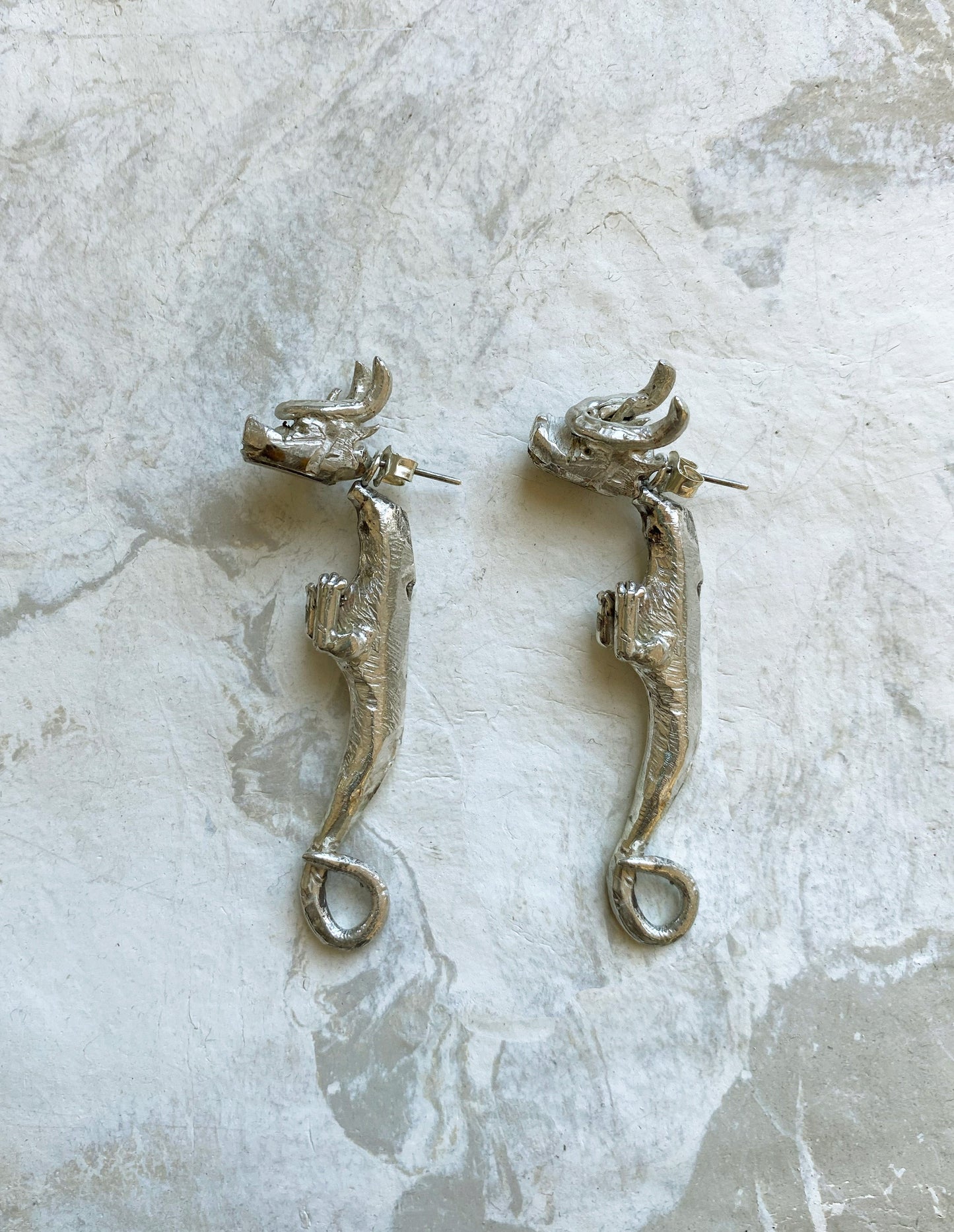 cuelebres earrings silver