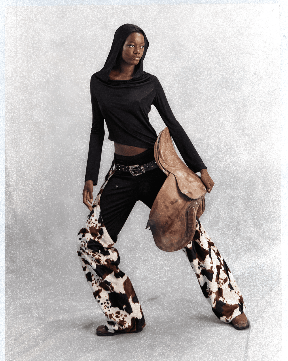 DALLAS CHAPS IN COW PATTERN FAKE FUR