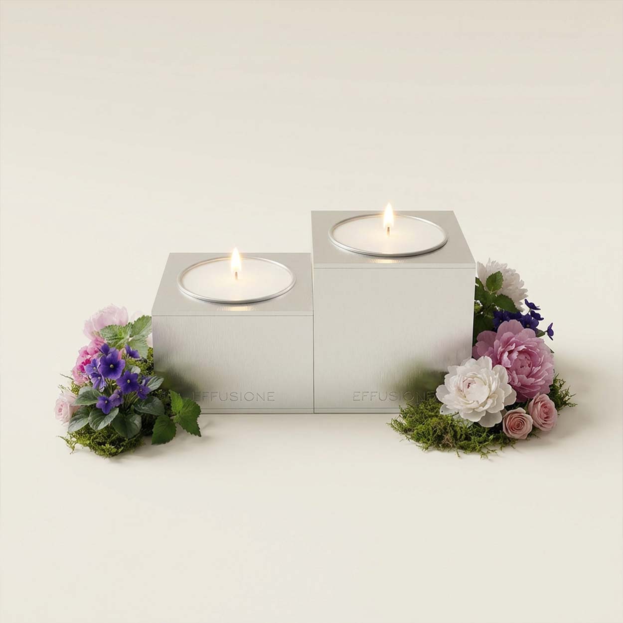 Candela magnetica Aura Double Oasi Zegna in alluminio satinato, fragranza Oasi Zegna con note fruttate e ambrate.