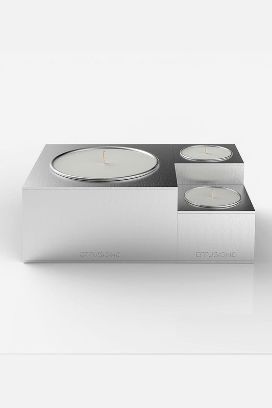 Collezione Aura Effusione, set di candele magnetiche componibili in alluminio di design con ricariche, vista frontale prospettica