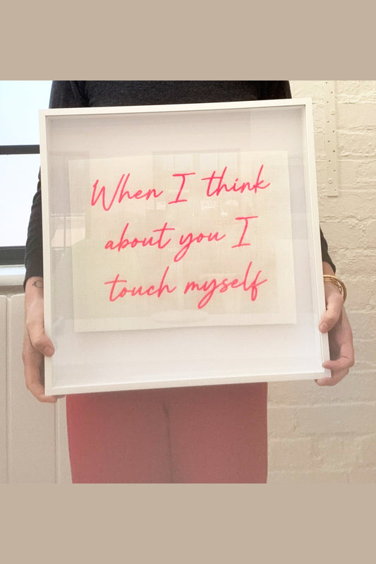 Lillyloves artwork titled "When I Think About You I Touch Myself" held in a close-up frame showing vibrant, expressive colors.